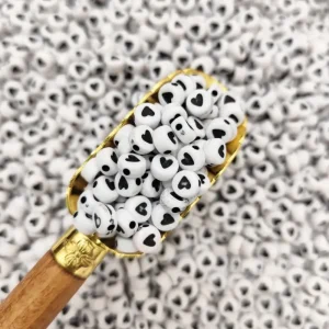 مهره سفید مشکی دایره قلب(100گرم)