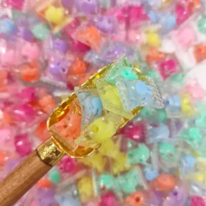 مهره رنگی شفاف بالشتی(100گرم)
